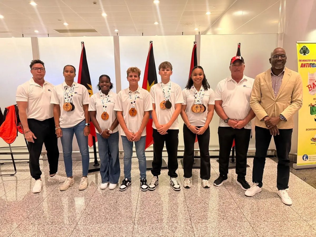 Sports Minister Welcomes Home Swimmers After Strong CARIFTA Aquatics Showing