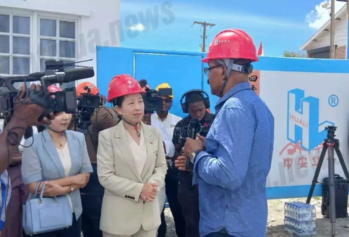 PM Browne and Chinese Ambassador Tour Near-Complete Booby Alley Housing Project