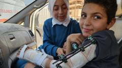 Boy whose father and nine siblings were killed in Israeli strike goes to Italy for treatment
